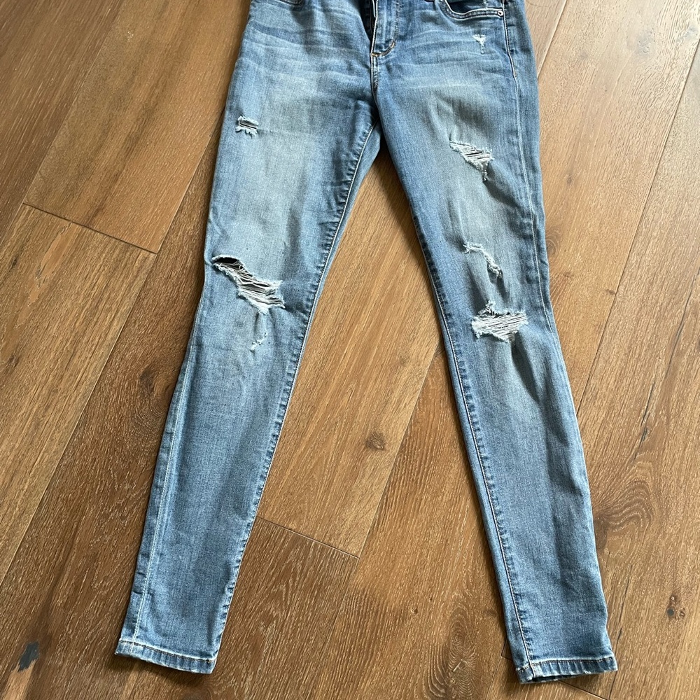 Women's Distressed Blue Jeans